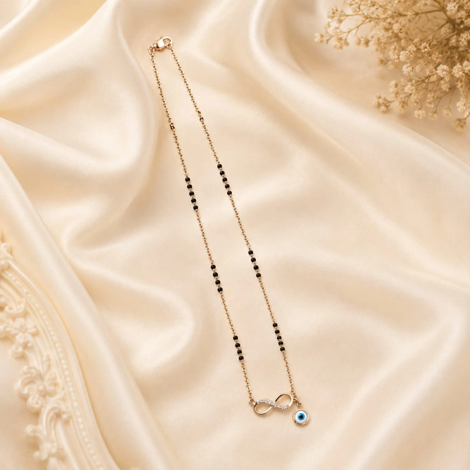 Elegant Gold Women’s Mangalsutra with Infinity & Evil Eye Pendant