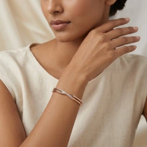 Elegant Bamboo-Style Crossover Rose Gold Bangle Gallery View