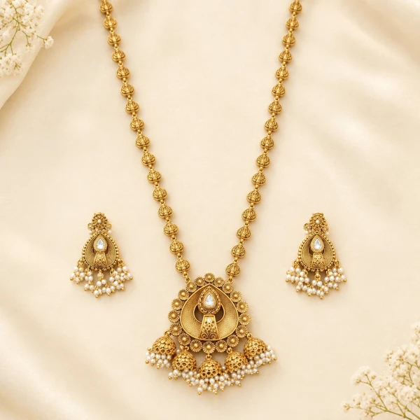 Elegant Gold Long Necklace Set with Teardrop Pendant and Pearl Accents